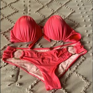 Victoria’s Secret two-piece swim suit. Top is 34D and bottoms are size M.